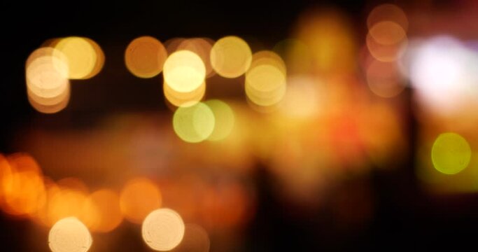 Colorful Backdrop display with twinkling night life shape blinking light. Bokeh abstract blurred background music festival stage show performance party. Vibrant bokeh background spark animate motion