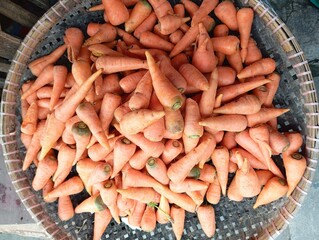 Carrots are orange vegetables that have a cylindrical shape and sweet, crunchy roots. Known as a source of beta-carotene, carrots contribute to eye and skin health