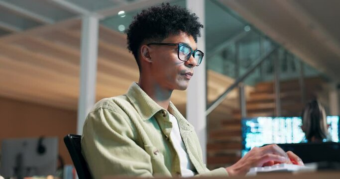 College, research and man reading on computer in library at night and typing information for project. Learning, knowledge and person with analysis of article, study or online search for education