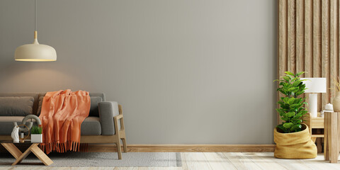 Dark living room interior background with grey sofa on gray wall and wooden flooring - 735582631