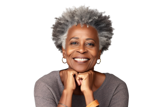 Happy middle aged mature black woman, senior older 50 year lady looking at camera touching her face isolated on white close up face portrait PNG