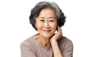 Happy middle aged mature asian woman, senior older 50 year lady looking at camera touching her face...