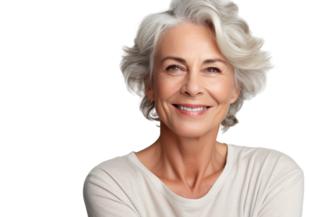 Happy middle aged woman, senior older 50 year lady looking at camera touching her face isolated on white close up face portrait