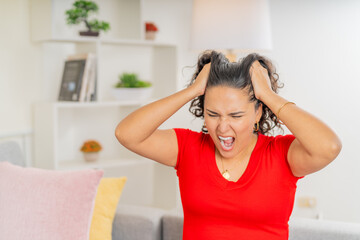 Woman Experiencing Intense Headache with a Painful Expression