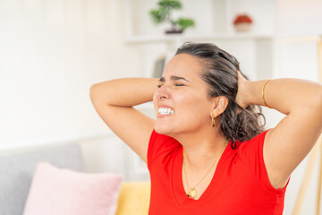 Frustrated Woman with Neck Pain at Home