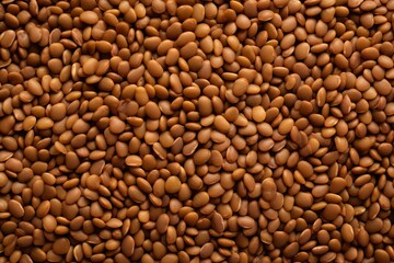 Brown raw buckwheat grains. Copy space for text. Background, pattern, texture.