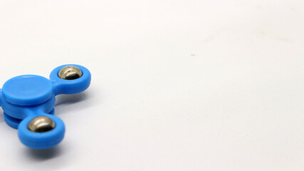 Blue fidget spinner isolated