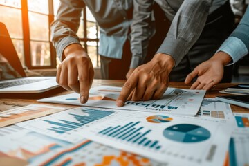 Business photography, Group of business people point to graphs and charts to analysis market data - obrazy, fototapety, plakaty