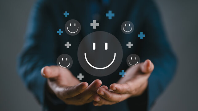 Hands holding happy smile face. mental health positive thinking and growth mindset, mental health care recovery to happiness emotion.