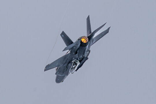  F-35 fighter aircraft, missile doors open, with afterburner
