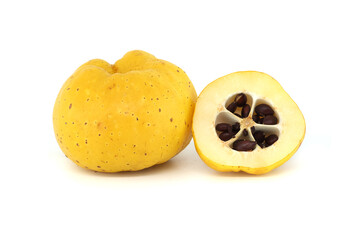 Vibrant quince fruits, both sliced and whole on white