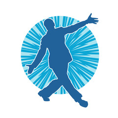 Silhouette of a male dancer in action pose. Silhouette of a slim man in dancing pose.
