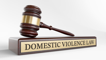 Domestic violence law: Judge's Gavel as a symbol of legal system and wooden stand with text word