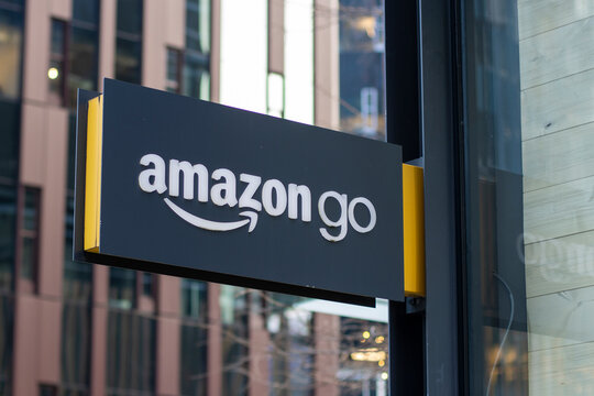 Seattle, WA, USA - Dec 20, 2023: Amazon Go sign is seen at the street corner outside of the Amazon Go store, a cashierless chain convenience store, on Amazon's headquarters campus in Seattle.