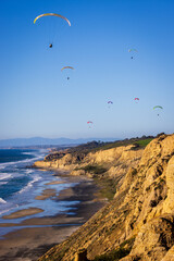 The black beach with paraglider