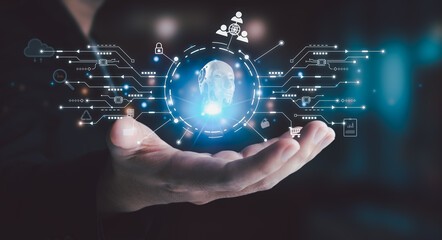 Businessman is showing concept of future technology and internet connection network with AI as controller. A graphic floated in the air on his hand. Data center network concept.