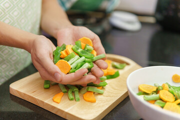 Colorful view of pieces of vegetables on a cutting board