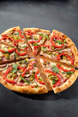 Meat lovers' pizza with bacon, ham, marinated pickles, and paprika, bursting with flavors and toppings