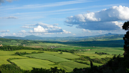 Fototapeta na wymiar VAL D'ORCIA, TUSCANY, ITALY - MAY 20 : Farmland in Val d'Orcia Tuscany on May 20, 2013