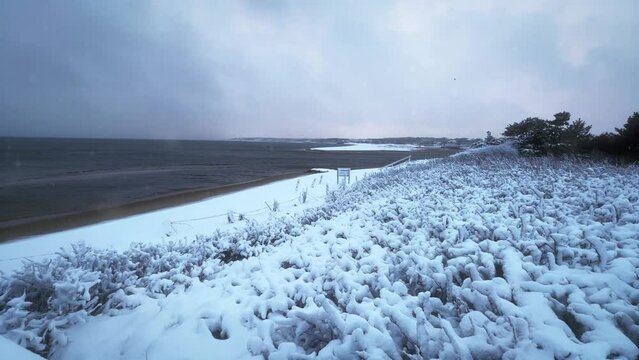 Cape Cod in Winter with Snow at Sunset on the Beach