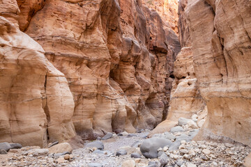 The extraordinary beauty of high mountains on the sides of the gorge of the tourist route of the gorge Wadi Al Ghuwayr or An Nakhil and the wadi Al Dathneh near Amman in Jordan