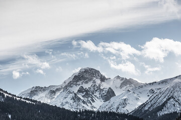 Snowcapped peaks. Winter mountain ridge.