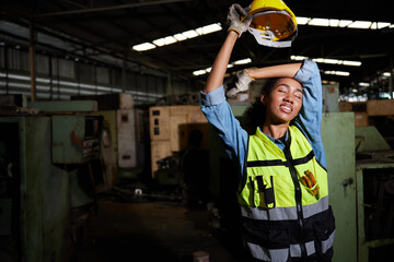 worker or engineer feeling tired from hot weather over heat in the factory