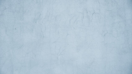 Abstract wide angle light blue stucco background. Wall building close up. rough surface plaster...