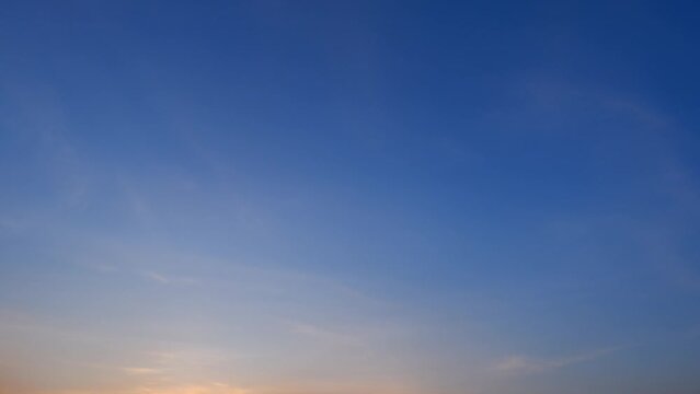 4K : Sunset sky time lapse : The breathtaking timelapse captures the vibrant hues of the sunset sky adorned with majestic clouds. A mesmerizing display of nature's artistry. Nature concept. 

