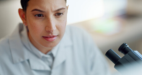 Science, research and woman with microscope, info and data report in laboratory. Medical...