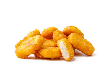 Pile of fried chicken nuggets isolated on white