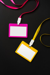 Blank badges on black background top view