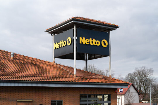Netto shop signboard with logo sign. Danish discount supermarket, retail chain. Convenience grocery store, shopping center signage with brand logotype on February 10, 2024 in Skawina, Poland.