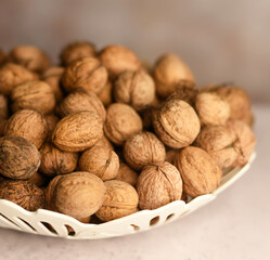 Harvest of walnuts close-up. Autumn