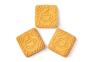 Three tea biscuits on a white background. Top view with shadow. Sweet shortbread biscuits with a picture of a cup of tea.