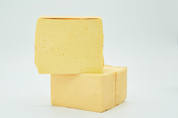 Cheese of soft varieties. The product is ready to use. White background.