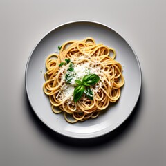 Delicious spaghetti served on a white plate