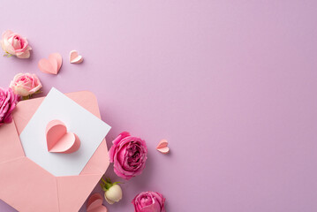 Celebrating Women's Day. View from top of an open envelope and love card, nestled among paper...