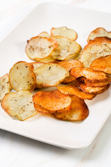 Homemade Potato Chips on black Board