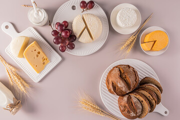 Traditional dairy treats for the holiday of Shavuot. cheese, cottage cheese, sour cream, bread,...