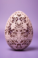 Fototapeta premium Intricately decorated easter egg on pastel studio background for spring celebrations and concepts