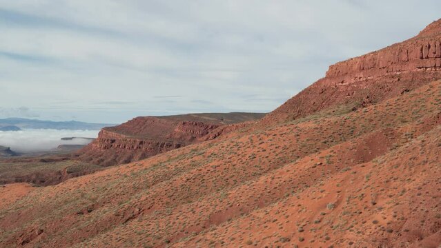 Aerial above red sand dunes on hillside of Sand Mountain in St George Utah in Warner Valley off road area