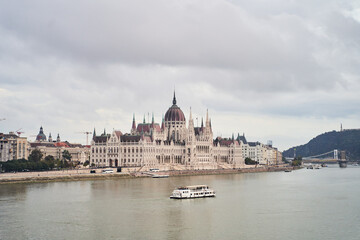 Fototapeta na wymiar Hungarian Parliament Building in the evening at the Danube river in Budapest, Hungary. High quality photo
