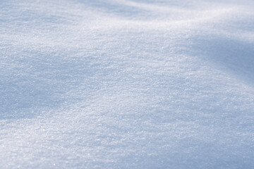 natural Snowdrift in sunny day. Nature Winter snow texture background.