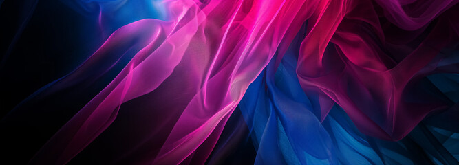 Flowing fabric in vibrant pink and blue hues.