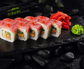Japaneese food, tuna sushi rolls on stone board