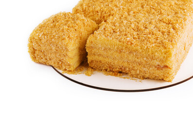 Napoleon Cake on a white plate isolated