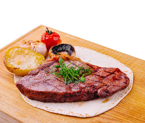 Delicious grilled pork chop on pita bread