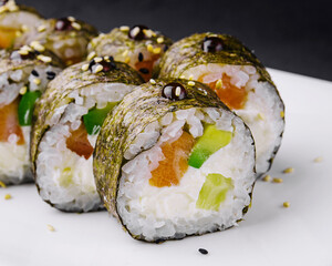 sushi maki with salmon and avocado