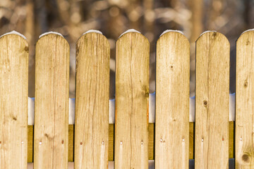 Wooden fence at winter